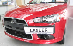 Рамка под номер на передний бампер (текстурный пластик) для Mitsubishi Lancer X (2010-2016)
